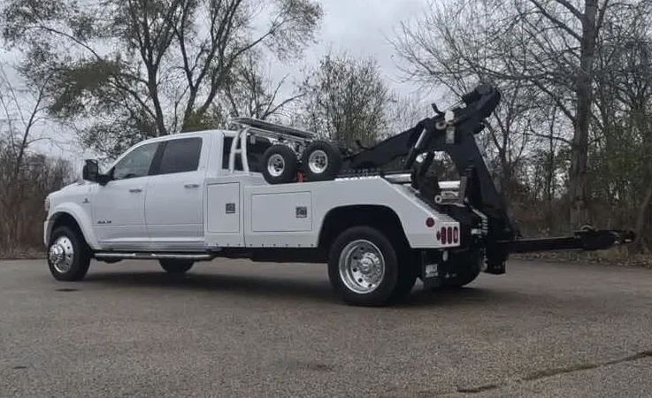 Edmonton wrecker equipment securing damaged vehicle